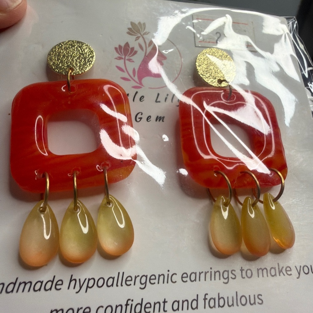 Handmade dangly orange and gold earrings
